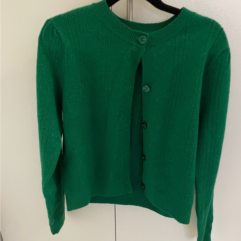 Green girl sweater.